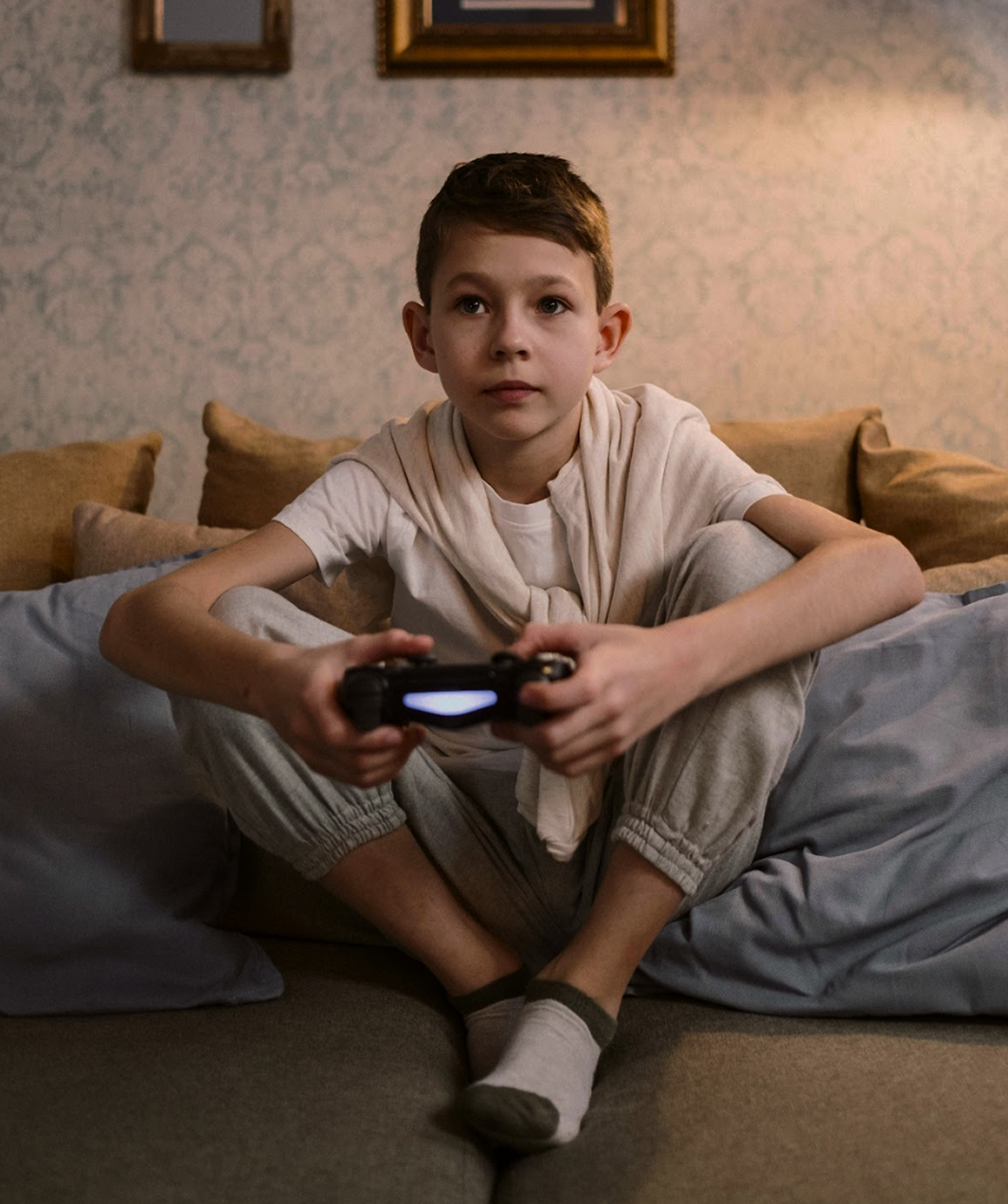 Global Freedom Summit; Child playing video games